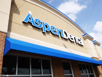 blue and white Aspen Dental Sign