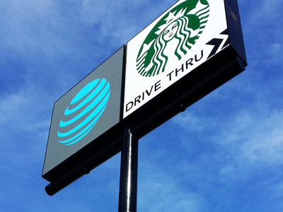 Starbucks and AT&T logo high rise signs
