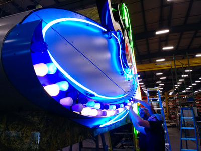 Neon sign being worked on