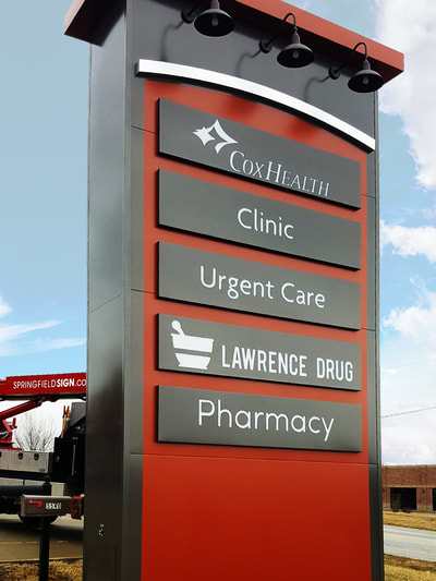CoxHealth, Clinic, Urgent Care, Lawrence Drug, Pharmacy signs