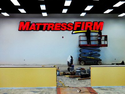 Mattress Firm Sign being installed
