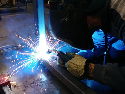 Springfield Sign Employee welding